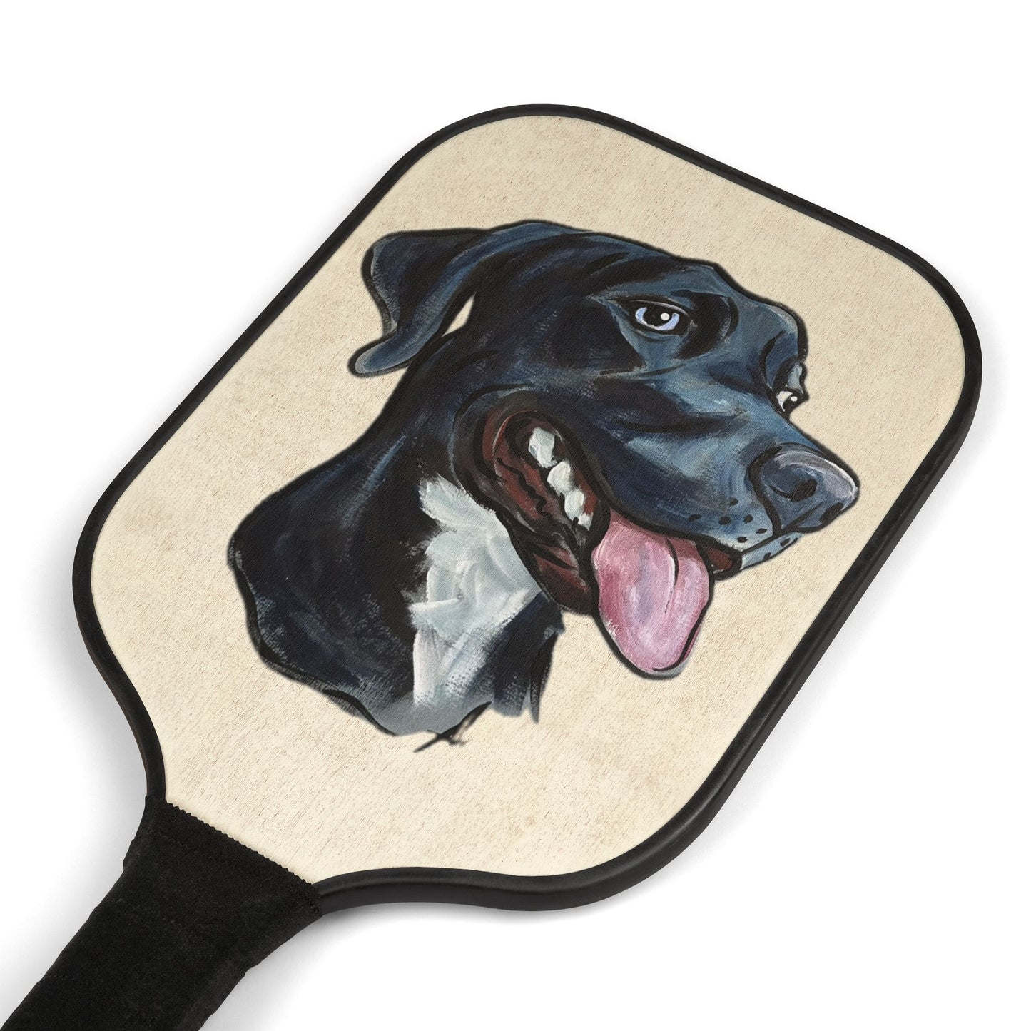 Pickleball paddle with a custom dog caricature portrait design on a white background