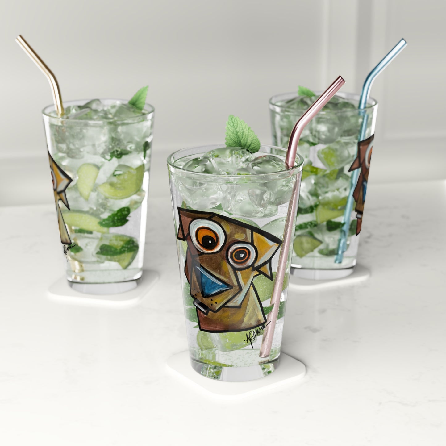Three glasses with animal-themed designs filled with a mojito cocktail on a white surface.